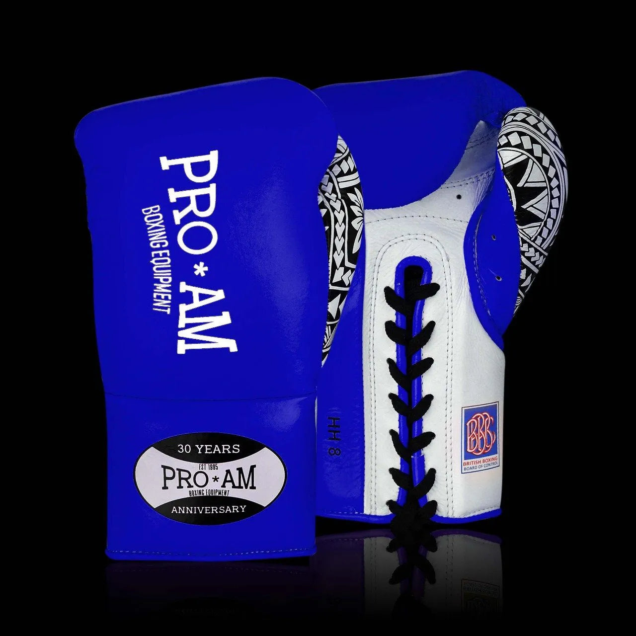 Proamboxinguk Valero professional boxing gloves with BBBofC approval, showing black and red padded boxing gloves for training or competition.