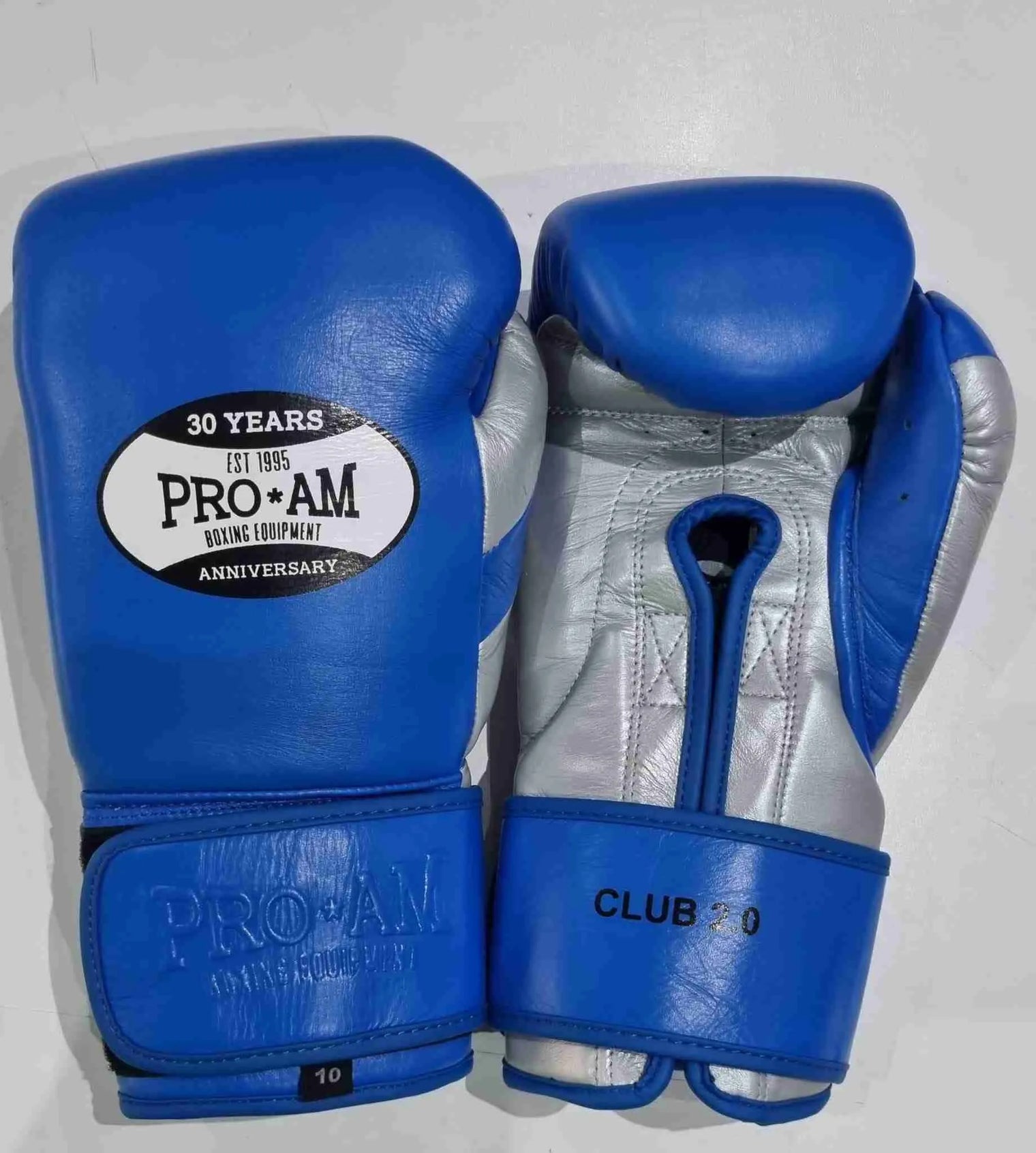 Pro-Am Club Range 2.0 boxing gloves by Proamboxinguk, black and red gloves with padded wrists for training and boxing.