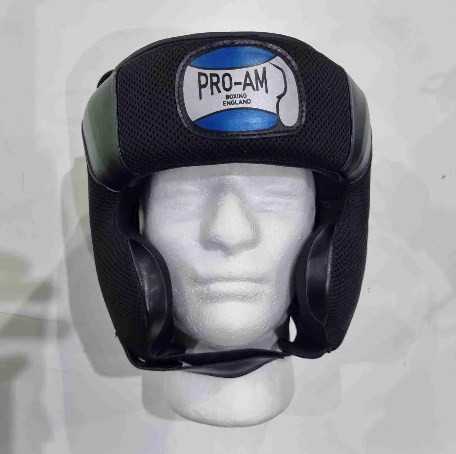 Pro-Am Lightweight Training Headguard for boxing protection, showing a black and red headguard with adjustable straps.