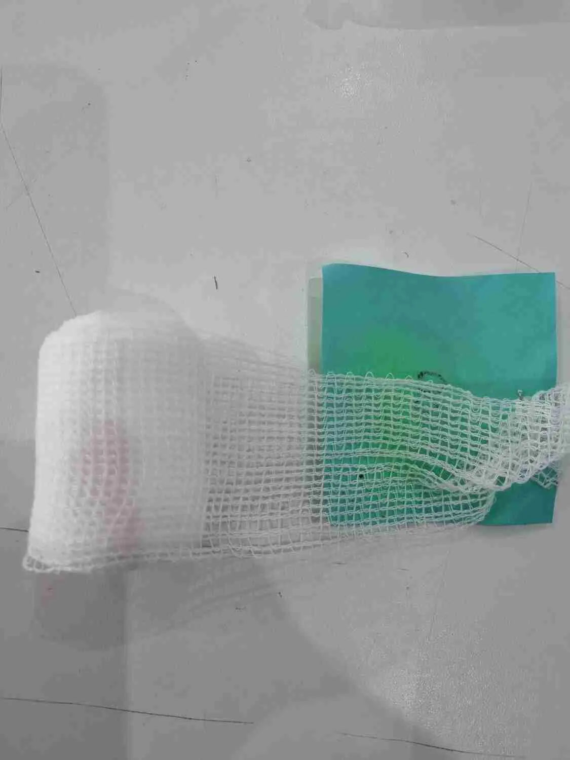 Proamboxinguk KO Wrap professional boxing bandages wrapped around hands for support and protection during training.