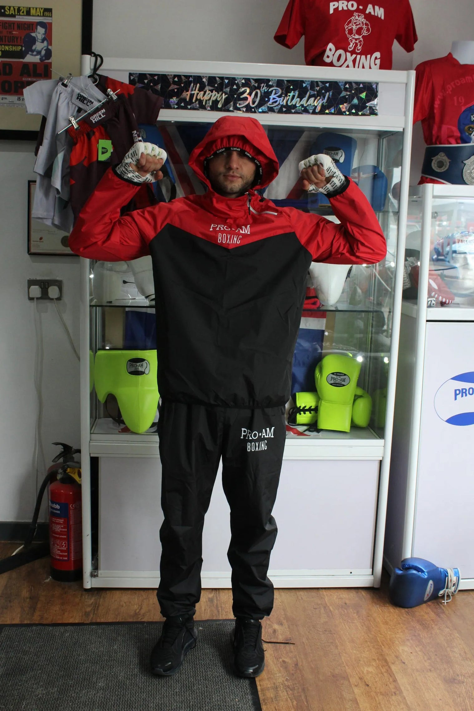 Pro-Am Sauna Suit by Proamboxinguk, full-body weight loss training suit with adjustable straps and breathable fabric.
