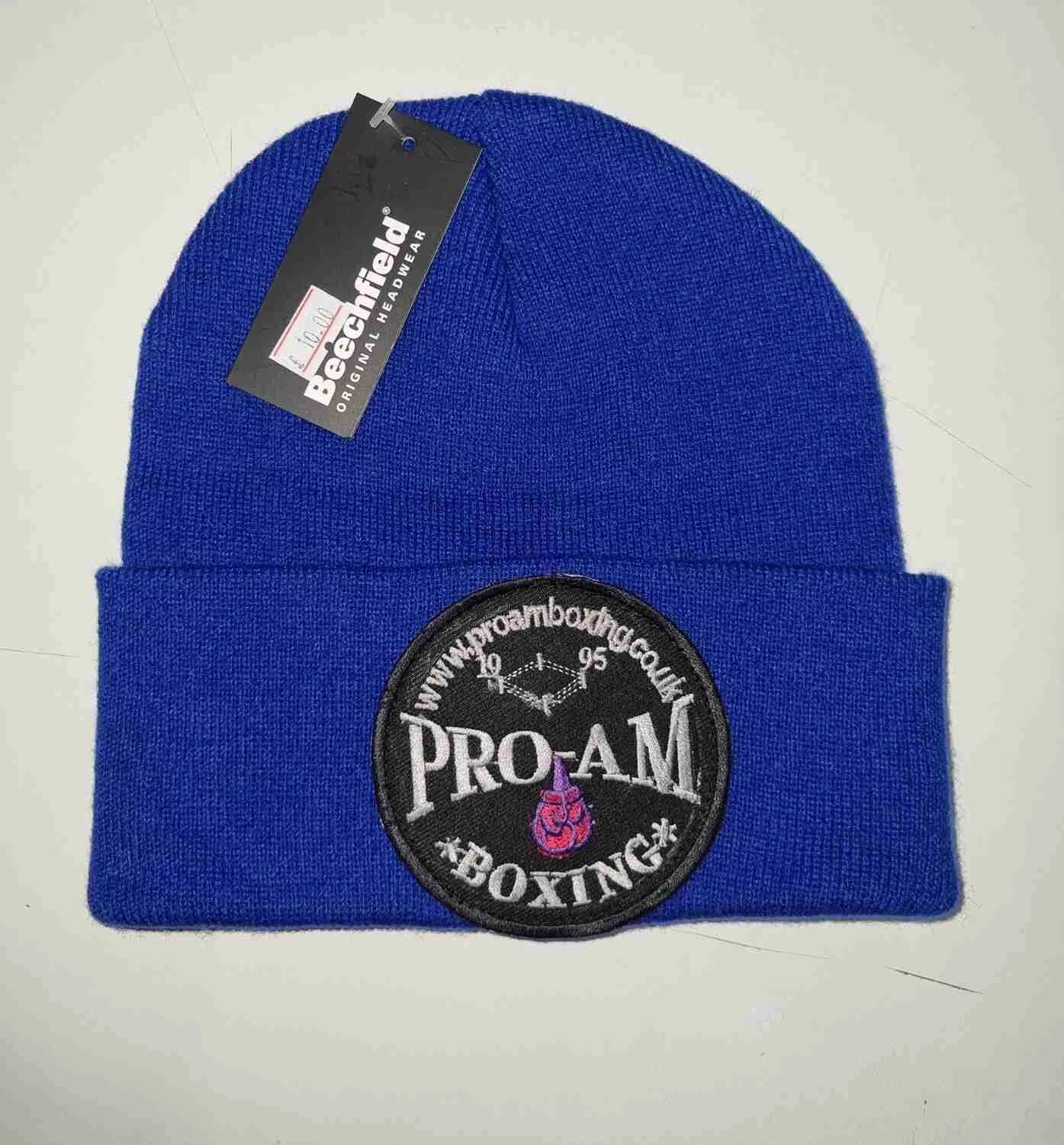 Pro-Am Boxing Beanie Hat by Proamboxinguk, navy blue knit cap with logo, suitable for sports and casual wear.