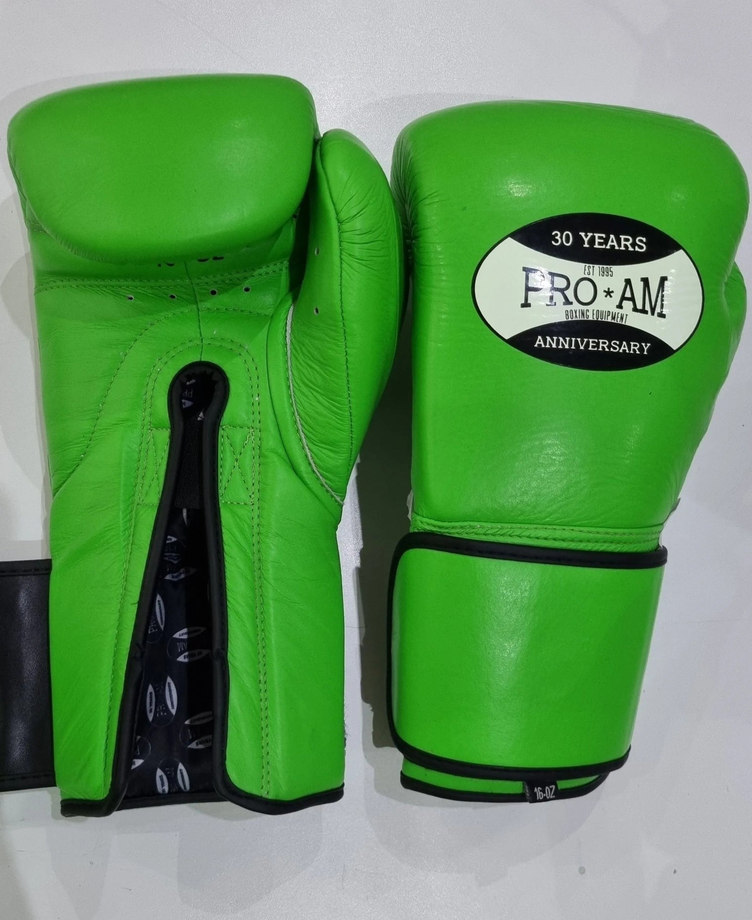 Pro-Am Professional Hybrid 2 Sparring Gloves with Velcro strap, black and red boxing gloves for training and sparring.
