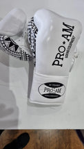 Proamboxinguk Valero professional boxing gloves with BBBofC approval, featuring black and red design and padded wrist support.