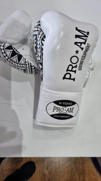 Proamboxinguk Valero professional boxing gloves with BBBofC approval, featuring black and red design and padded wrist support.