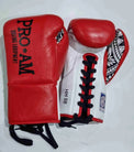 Proamboxinguk Valero Professional Contest Boxing Gloves with BBBofC approval, showing black and red padded boxing gloves.
