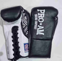 Proamboxinguk Valero professional contest boxing gloves with BBBofC approval, featuring black and red design and padded wrist support.
