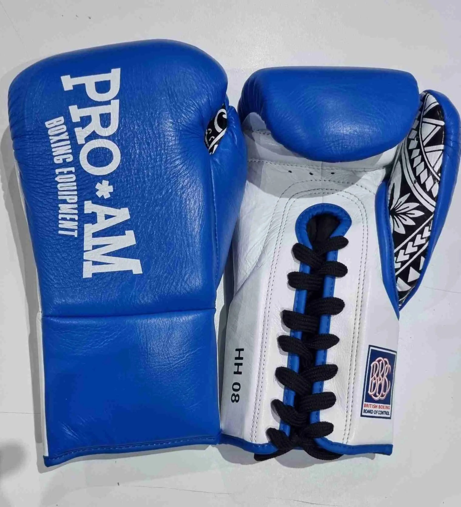 Proamboxinguk Valero Professional Contest Boxing Gloves with BBBofC approval, featuring black and red padded leather for combat sports.