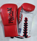 Pro-Am Undisputed professional boxing gloves in black with padded palms and secure wrist straps, branded by Proamboxinguk.