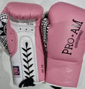 Pro-Am Undisputed professional boxing gloves by Proamboxinguk, BBBofC approved, shown with padded wrist support and black design.
