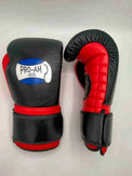 Pro-Am Coach sparring boxing gloves by Proamboxinguk with padded wrists and vibrant red and black design for training and sparring.