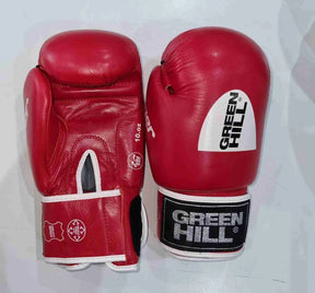 Greenhill IBA approved competition boxing gloves by Proamboxinguk, featuring green leather with padding for boxing training and matches.