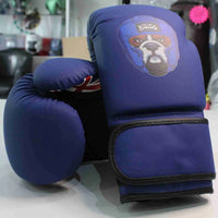 Kids Pro-Am boxing gloves by Proamboxinguk, vibrant red and black with foam padding for young boxers' training and sparring.