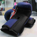 Kids Pro-Am boxing gloves by Proamboxinguk, colorful padded gloves designed for young children for safe boxing practice.