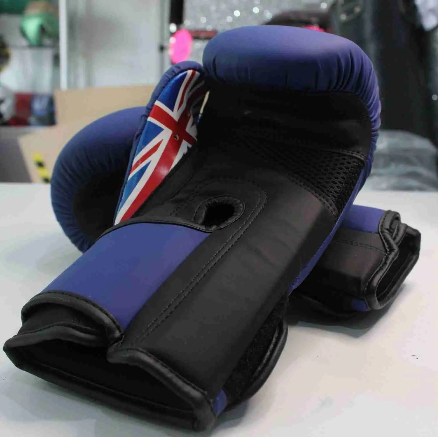 Kids Pro-Am boxing gloves by Proamboxinguk, colorful padded gloves designed for young children for safe boxing practice.