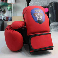 Kids boxing gloves by Proamboxinguk, colorful Pro-Am Kids Boxing Gloves with padded wrist support and secure Velcro straps.