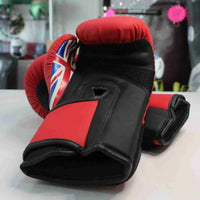 Kids' Pro-Am boxing gloves by Proamboxinguk, padded and colorful for young fighters, shown in a close-up view.