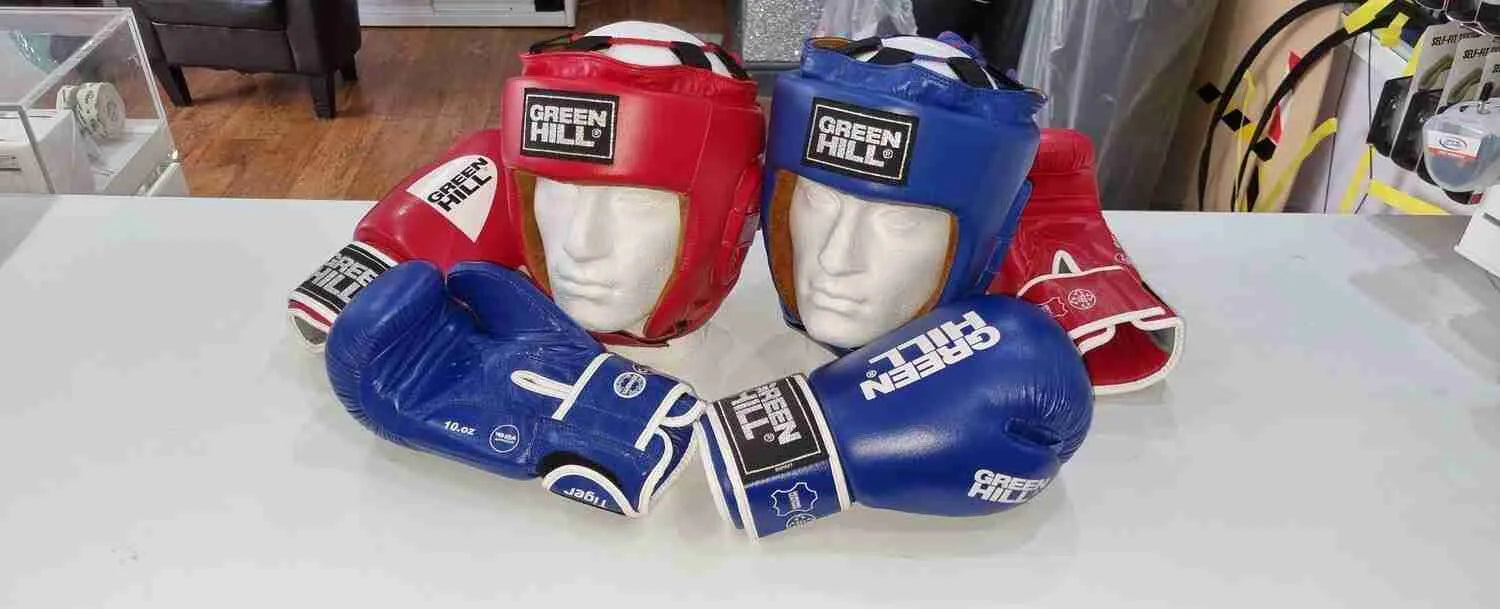Greenhill IBA Approved amateur boxing headguard by Proamboxinguk, featuring padded headgear with adjustable straps for protection.