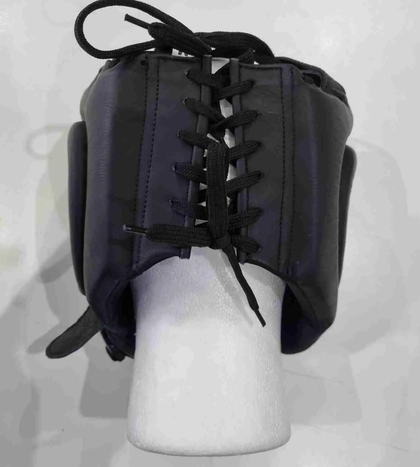 Pro-Am V-Shadow professional headguard showing padded head protection and adjustable strap, designed for boxing training and sparring.