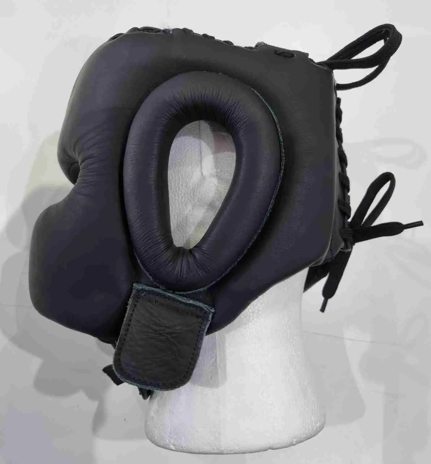 Pro-Am V-Shadow professional boxing headguard showing padded headgear with adjustable straps and branding details.