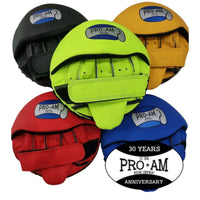 Pro-Am Speed Focus Pads for boxing training, featuring black and red design from Proamboxinguk, held in a trainer's hands.