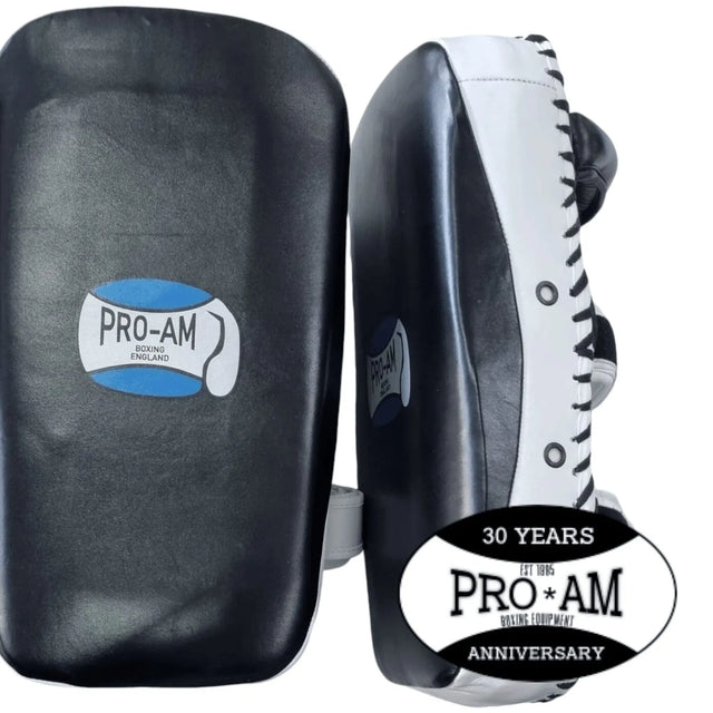 Pro-Am Thai kick pads by Proamboxinguk, durable boxing equipment for training and martial arts practice.