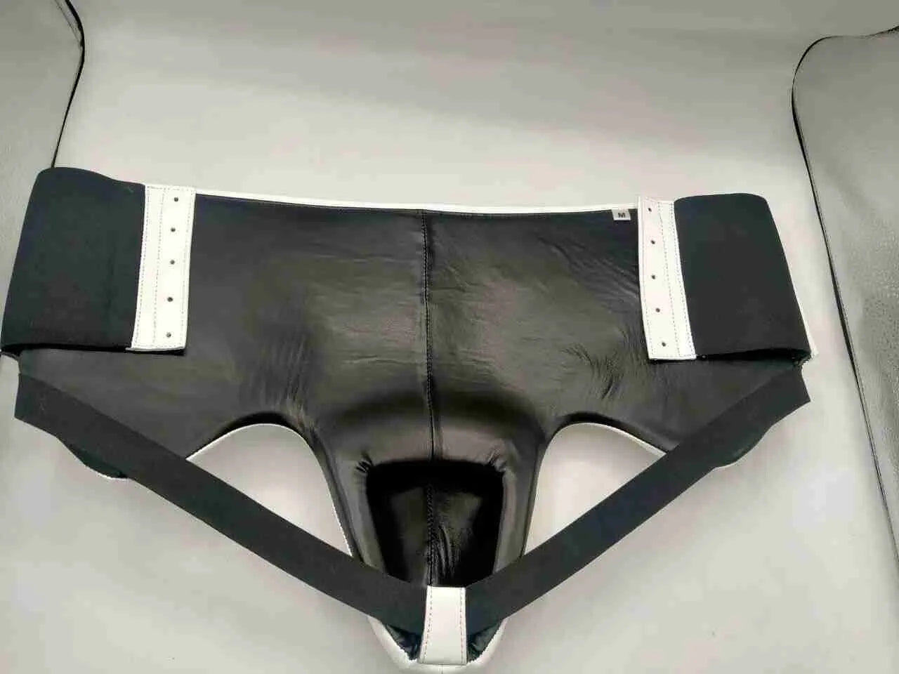 Pro-Am No Foul abdominal guard and groin protector for boxing, featuring padded protection and adjustable straps.