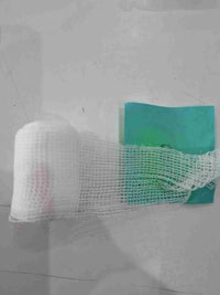 Proamboxinguk KO Wrap professional boxing bandages wrapped around hands for support and protection during training.