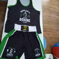 Proamboxinguk custom boxing shorts and vest with logo, featuring athletic design and vibrant colors for boxing training.