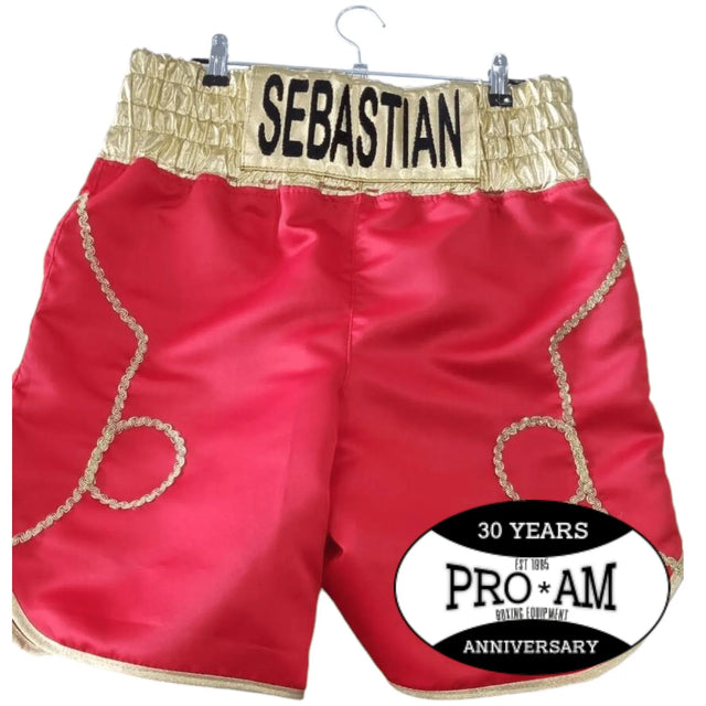 Personalized custom boxing shorts by Proamboxinguk with name and logo, featuring vibrant fabric and athletic fit for boxing training.