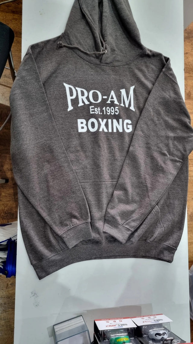Pro-Am Boxing Hoodie by Proamboxinguk, featuring a comfortable black hoodie with boxing-themed logo and design.