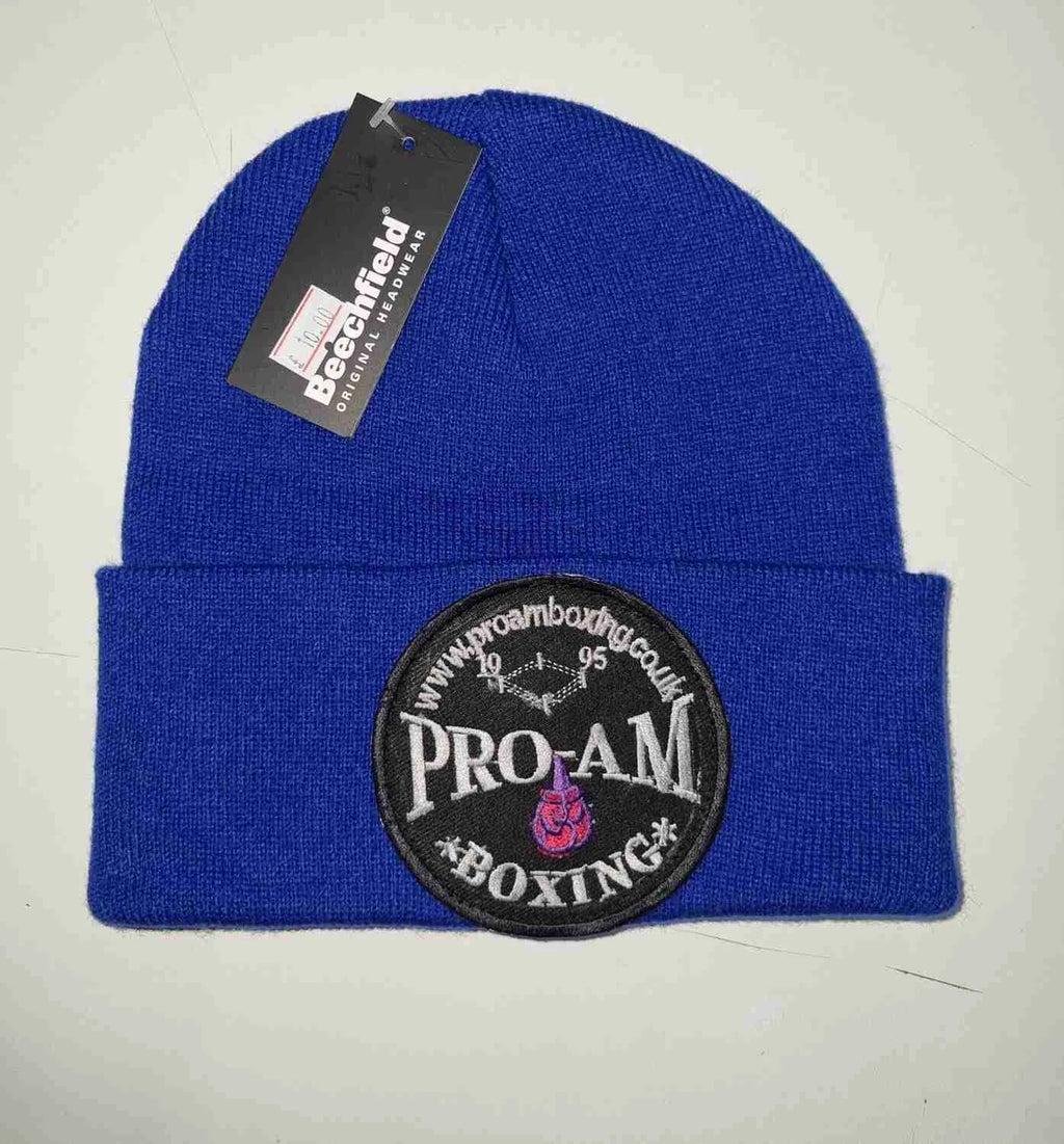 Pro-Am Boxing Beanie Hat by Proamboxinguk, navy blue knit cap with logo, suitable for sports and casual wear.