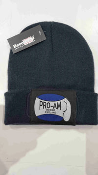 Pro-Am Boxing Beanie Hat by Proamboxinguk, close-up of black knit hat with folded cuff and logo branding.