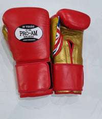 Pro-Am Heavy Hitters Club boxing gloves in black with red accents, featuring padded wrist support and Proamboxinguk branding.