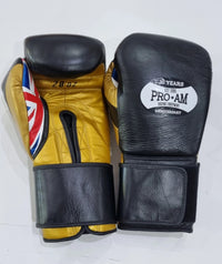 Pro-Am Heavy Hitters Club boxing gloves in black with red accents, showcasing padded palms and adjustable wrist straps.