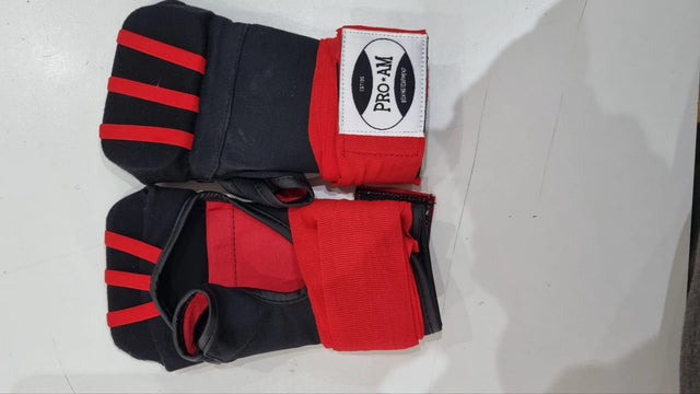 Pro-Am Pro Fast Wraps boxing hand wraps in black with blue accents, showing the quick and easy wrap design for boxing training.