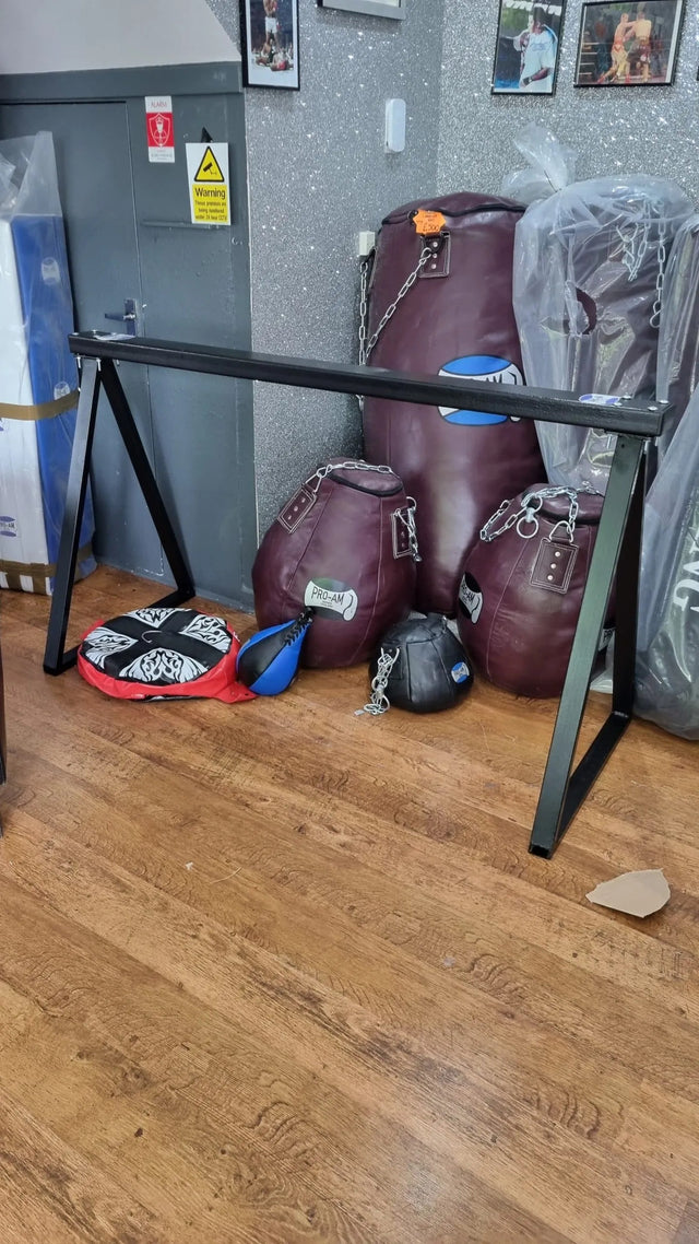 Proamboxinguk boxing bar and bag jumping hurdle for agility training, featuring a colorful adjustable hurdle with padded support
